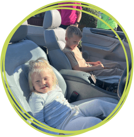 Children enjoying the car